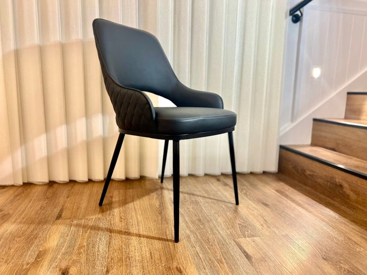 Prada Curved Back Dining Chair with Stainless Steel Black Legs