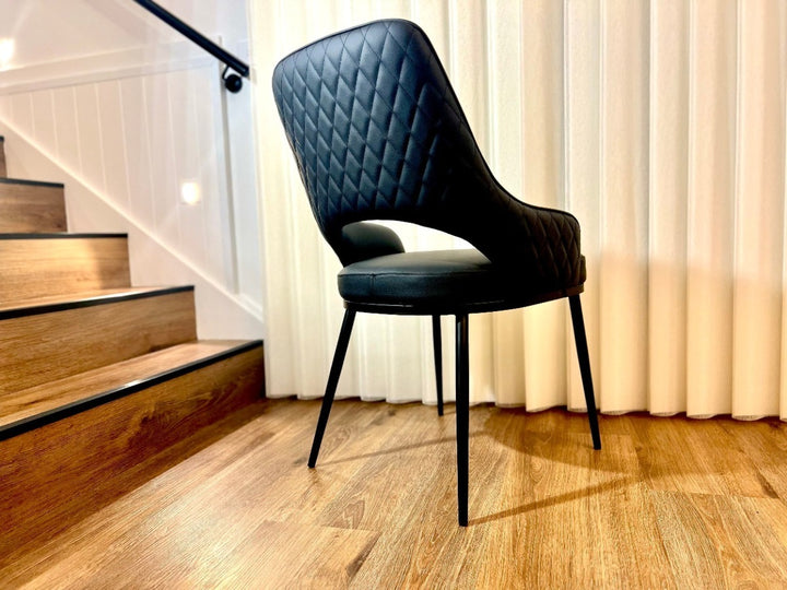 Prada Curved Back Dining Chair with Stainless Steel Black Legs