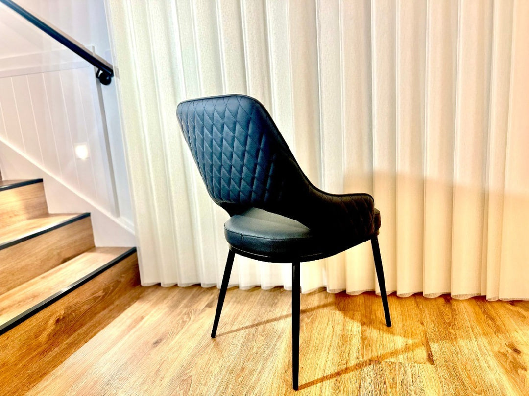 Prada Curved Back Dining Chair with Stainless Steel Black Legs