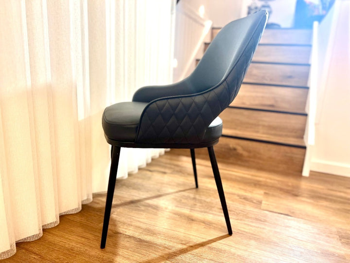 Prada Curved Back Dining Chair with Stainless Steel Black Legs