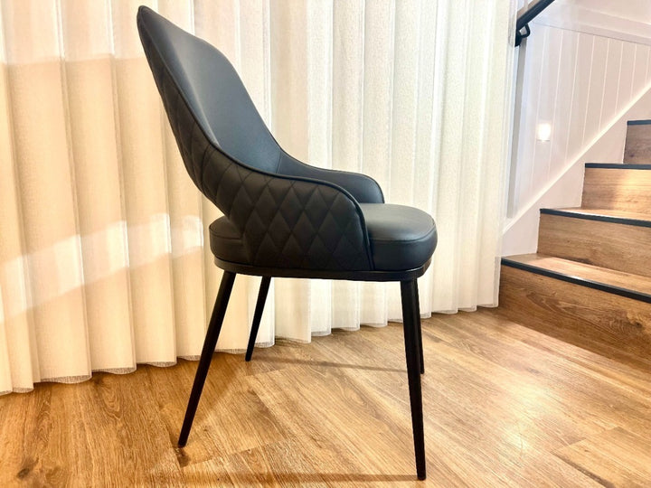 Prada Curved Back Dining Chair with Stainless Steel Black Legs