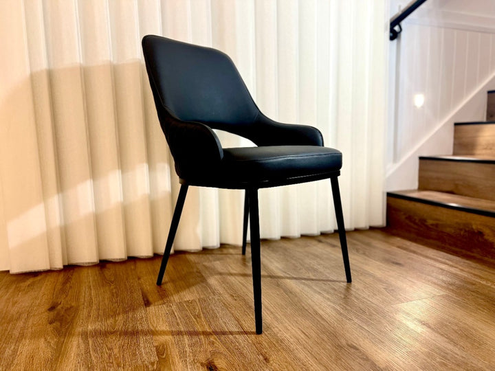 Prada Curved Back Dining Chair with Stainless Steel Black Legs